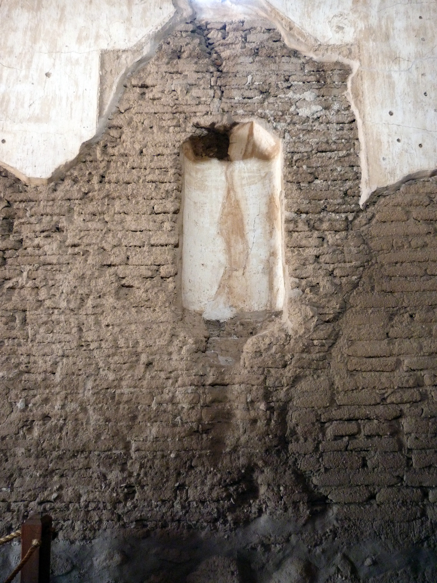 detail of plastered niche with corbel missing