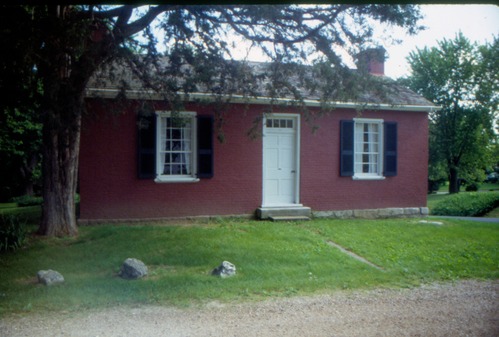 Image of a small brick house.