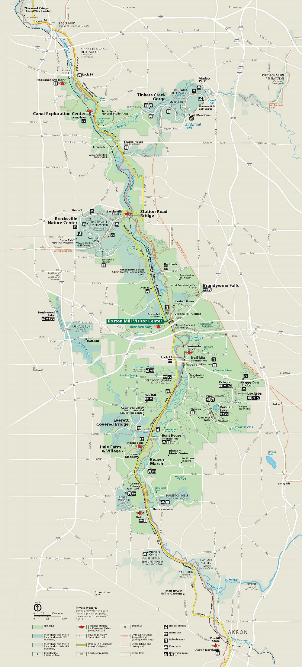 Map of Cuyahoga Valley National Park in Ohio. The long, roughly teardrop-shaped park is shown in light green and surrounding areas in tan. Roads are mostly shown as white lines, and a byway through the park is yellow.