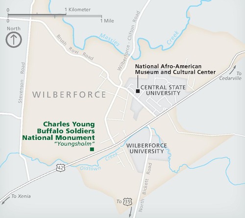 Map of Charles Young Buffalo Soldiers National Monument (NM) in Wilberforce, Ohio. The long edge of the trapezoidal-shaped town is angled to the northeast. The town is shown in beige, surrounding areas in blue, and the park represented with a green square.