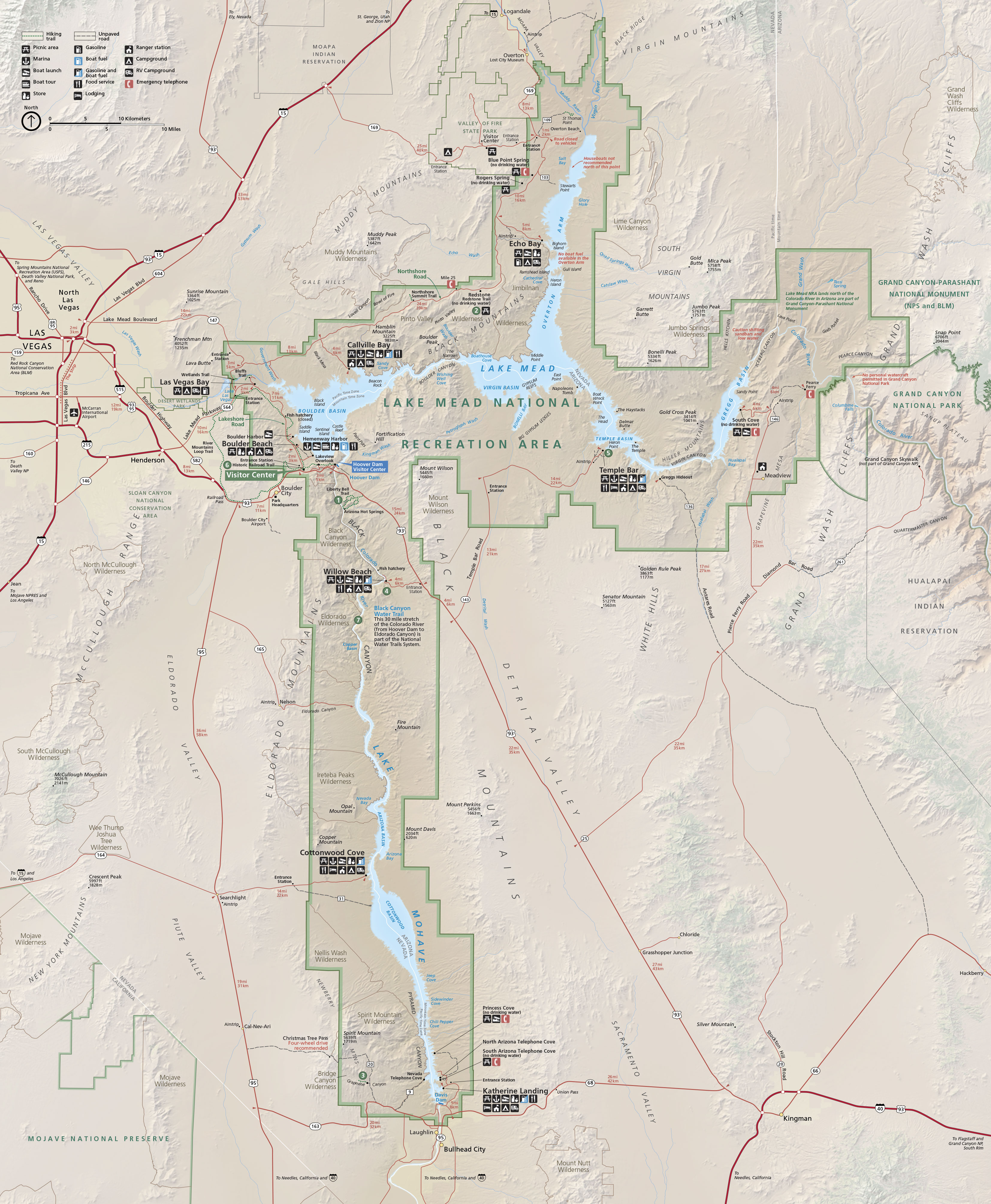 Map of the Lake Mead National Recreation Area in Arizona. The park is roughly shaped like a hammer with a spike at the top. It’s outlined in green, and the surrounding area is tan. Highways are represented by red lines and trails by dotted green lines. Seven sites labeled with white numbers in green circles are scattered through the park.