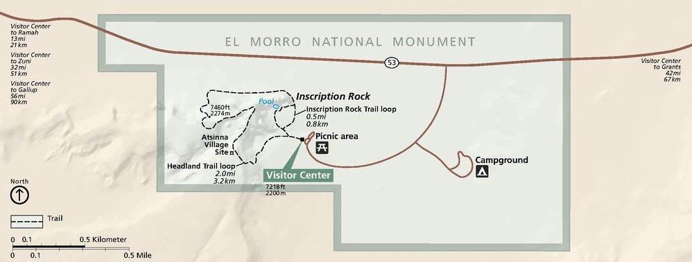 Park map of El Morro National Monument in New Mexico. The park is outlined in green and filled in with a paler shade. The surrounding areas are beige and roads are dark brown.