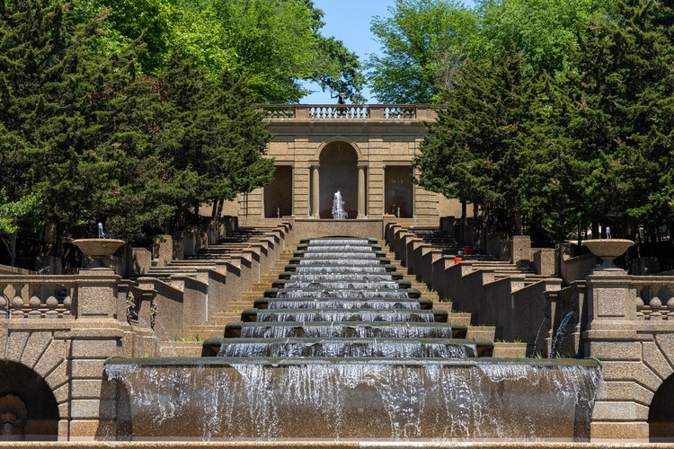 Water cascades down a large fountain. 
