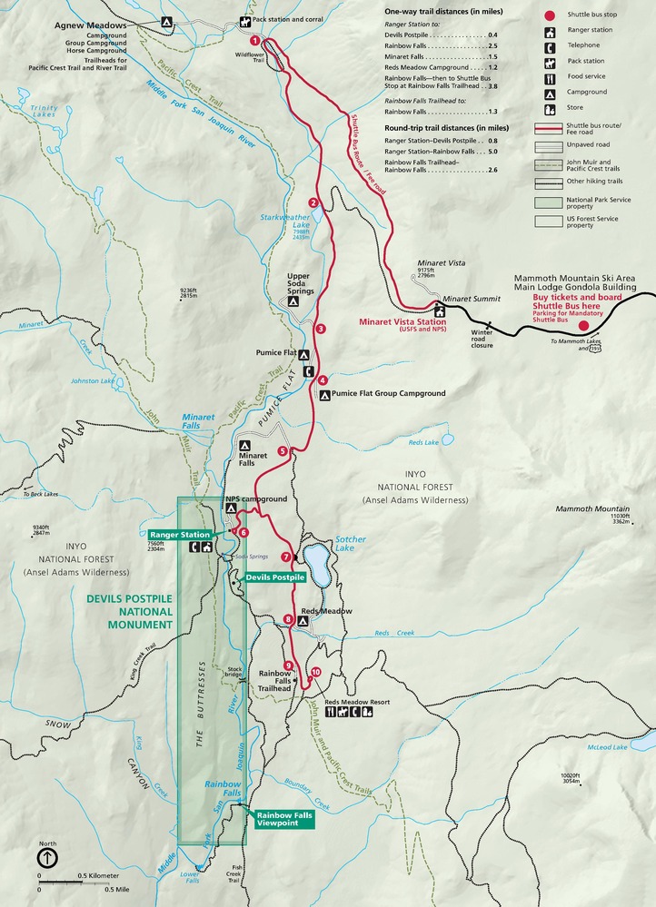 Map of Devils Postpile National Monument in California. A tall, narrow rectangle encloses the monument in the lower left quadrant of the map. A shuttle route represented in red and hiking trails create pathways across the Inyo National Forest (Ansel Adams Wilderness) in which the monument is located.