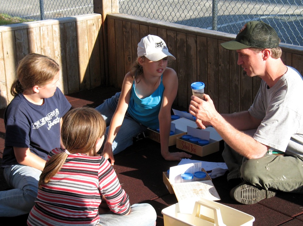 Dr. Jim McKenna, Schoodic Education and Research Center director, works with students during the blitz.