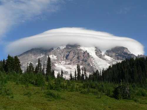 Mount Rainier wrapped in clouds. 