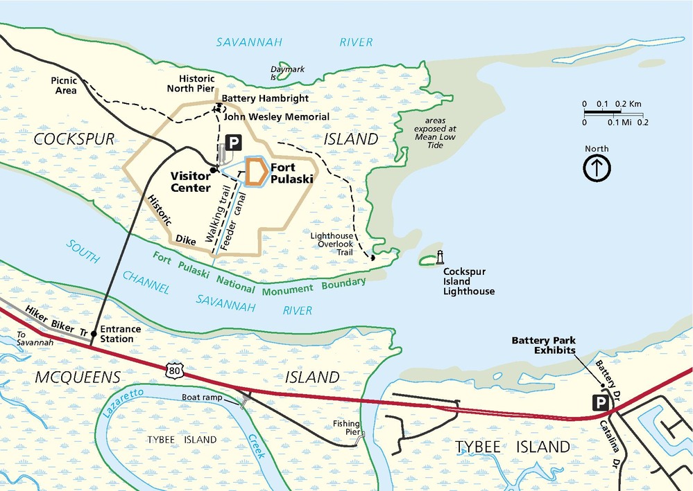 Map of Fort Pulaski National Monument in Georgia. The Savannah River and its connecting waterways are indicated in blue and the landforms of Cockspur Island, Tybee Island, and McQueens Island in off-white mostly patterned with pale blue diamonds, representing wetlands.