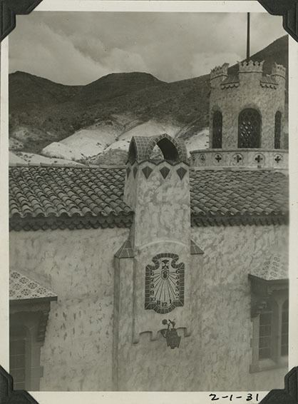 This is an historic black and white photograph from the Scotty's Castle Historic Photograph Collection, Death Valley National Park of sundial in Scotty's Castle Main House and Annex Enclosed Patio. February 1, 1931. Photographed by Mat Roy Thompson.