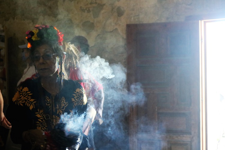 Woman surrounded by smoke. 