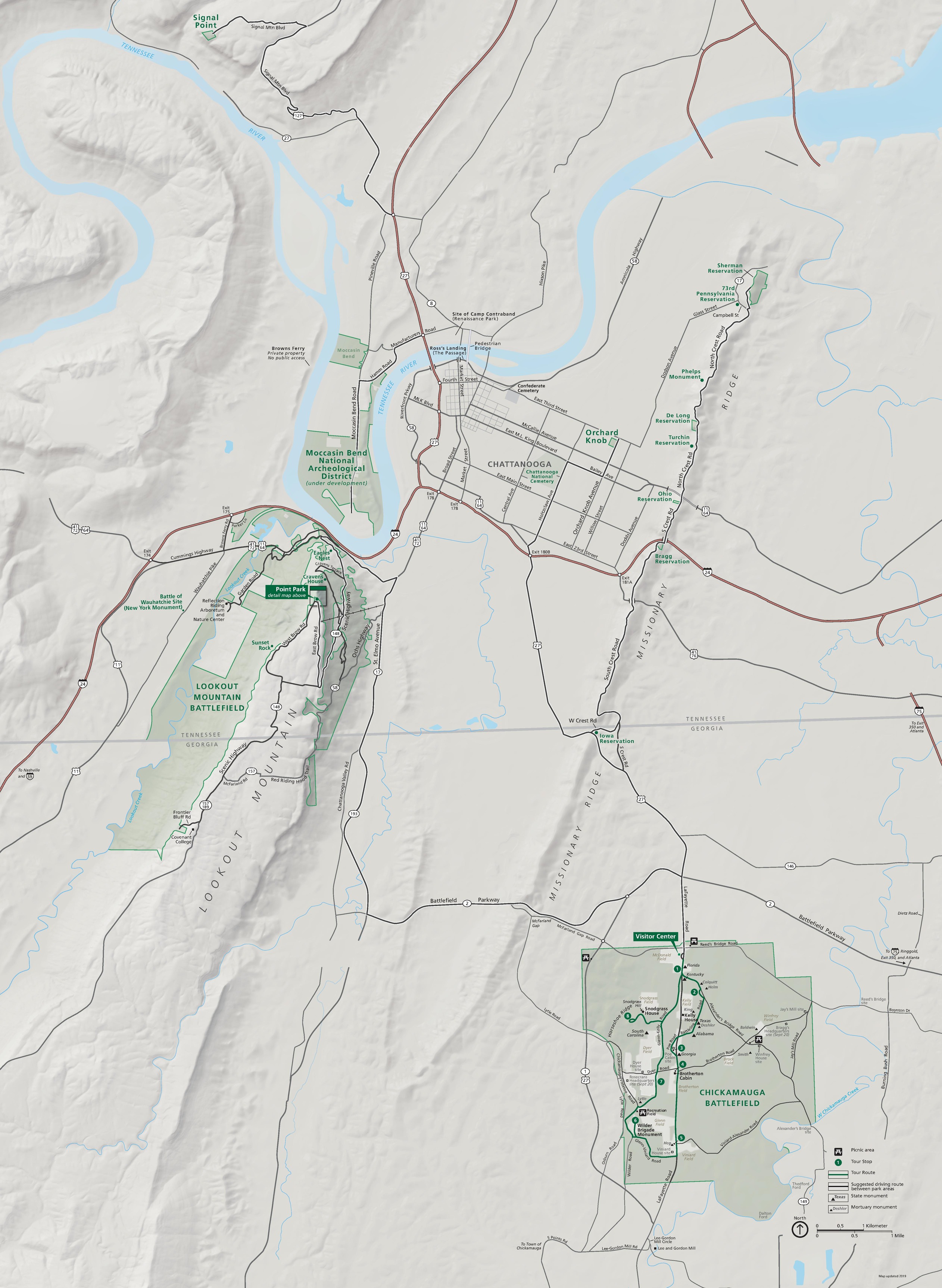 Map of Chickamauga and Chattanooga National Military Park in Tennessee and Georgia. Park areas are shaded pale green, and winding rivers and creeks are blue. The surrounding mountains and valleys are gray.