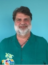 White man with blue background.