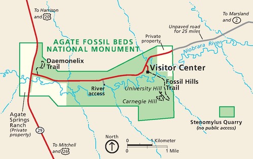 Map of Agate Fossil Beds National Monument in Nebraska. Shown in green against a tan background, the park is long, running from east to west. The Niobrara River ripples across the length of the park, which is accessible via a park road that branches off State Route 29.