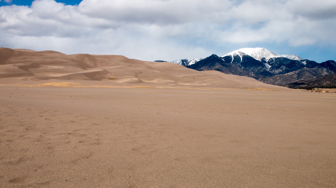 The Great Sand Dunes sit below the Sangre de Cristo Mountains. 