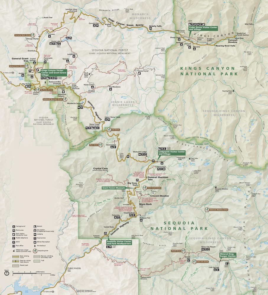 Park map of Sequoia National Park and Kings Canyon National Park in California. Kings Canyon National Park, highlighted olive green, is in two parts: a large, squarish unit at the top right corner of the map, and a small corkscrew shape at the left side of the map. These areas border the northern extent of Sequoia National Park, which extends in pale green across most of the bottom half of the map.