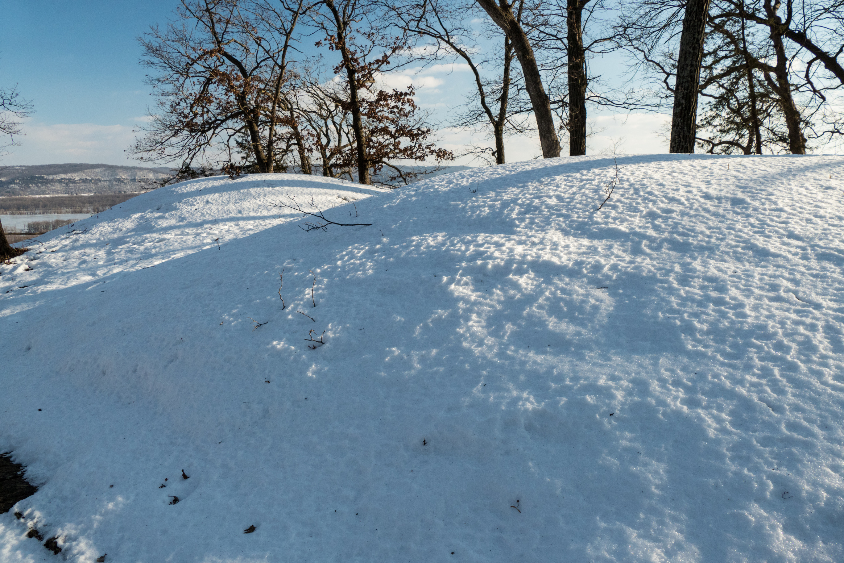 Large round mounds covered in snow. 