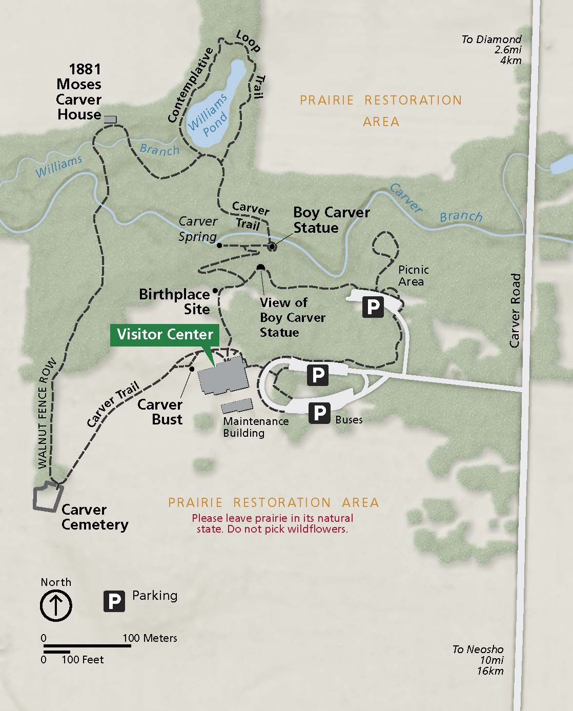 Map of George Washington Carver National Monument in Missouri. The park, shown in green, creates a band across the middle of the map. Surrounding areas are tan. Trails are shown as black dashed lines, roads in white, and sites in gray.