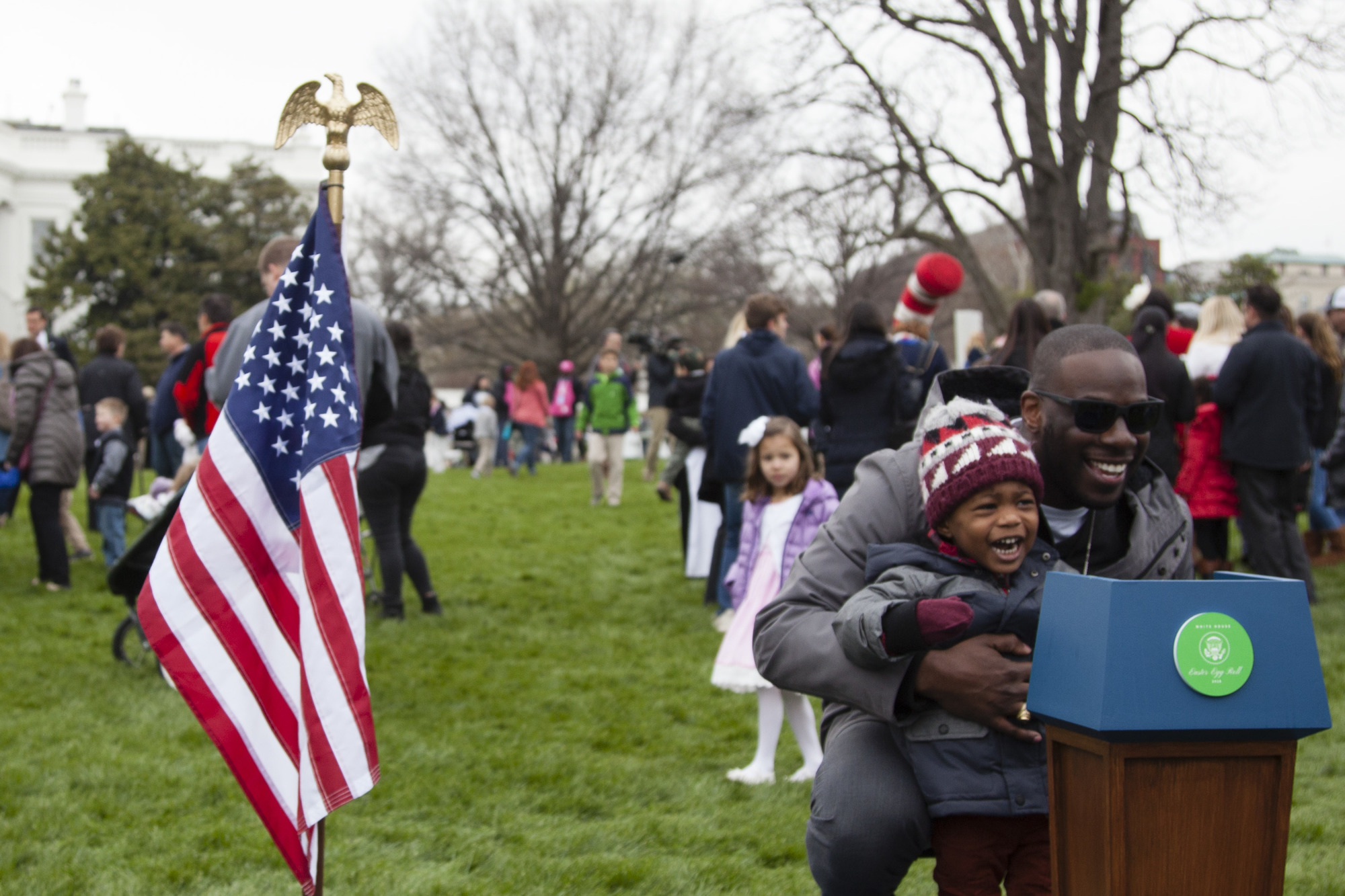 A young boy poses as the future President of the United States in front of the White House. 