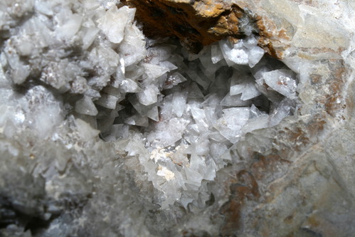 Sharp pointed crystals in a hole in limestone
