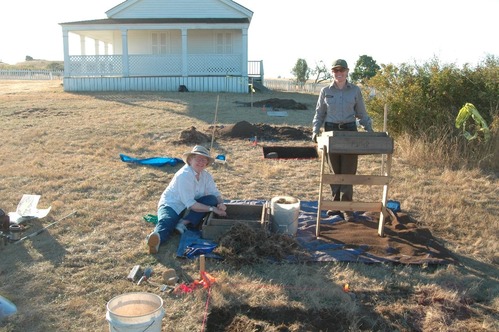 NCRI Archaeologist Cheryl Paddock and a volunteer screen for artifacts at American Camp in San Juan Island National Historical Park