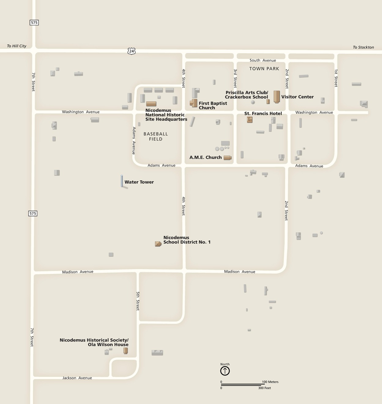 Map of Nicodemus National Historic Site in Kansas. A stepped grid of streets is shown in white against a tan background, and named buildings are shown in perspective in brown. Other buildings around the site are grayed out.