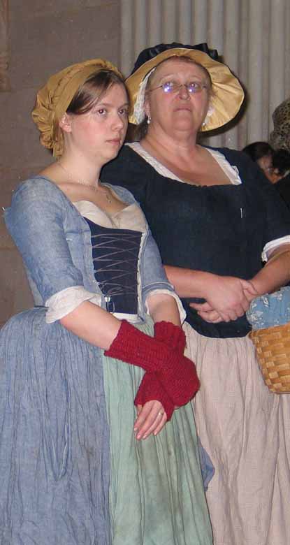 Re-enactors portray women from the Revolutionary War period.