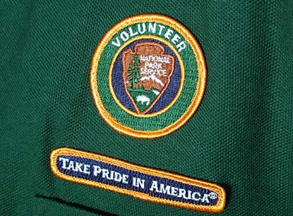 Uniform patch for the National Park Service Volunteer Program.
