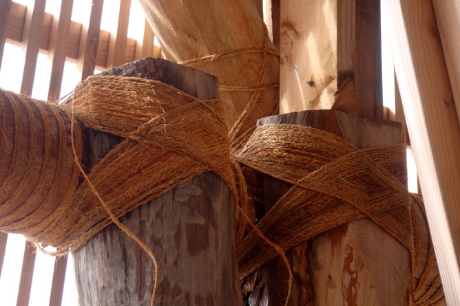 Hand-woven coil of coconut fibers -- sennit, used to tie up lumber used for fale framing structures. Hand-woven coil of coconut fibers -- sennit, used to tie up lumber used for fale framing structures.