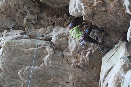 Man climbing on rock wall