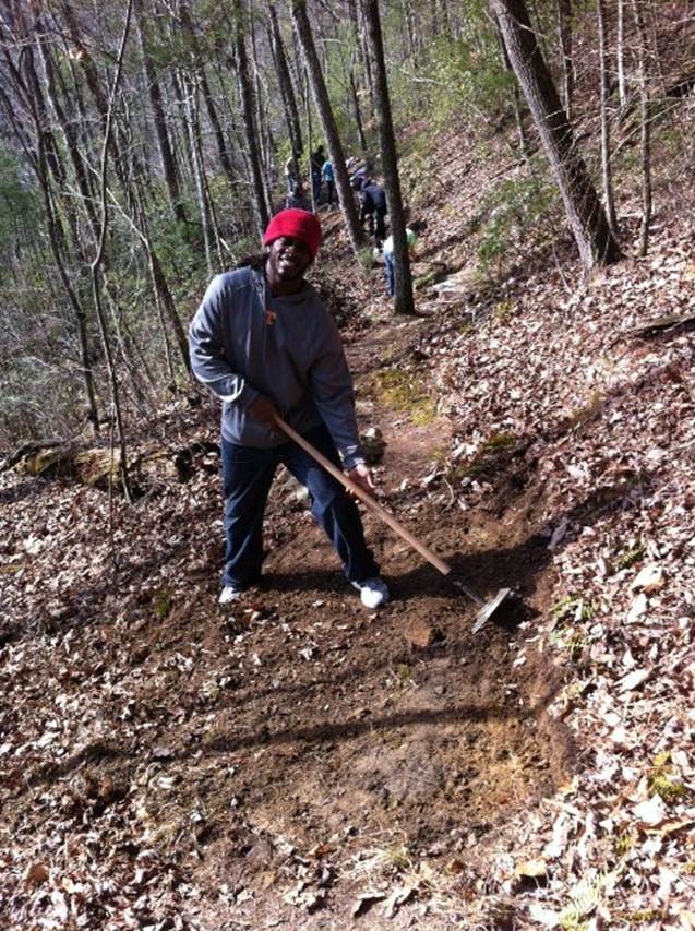 Volunteer working on trail