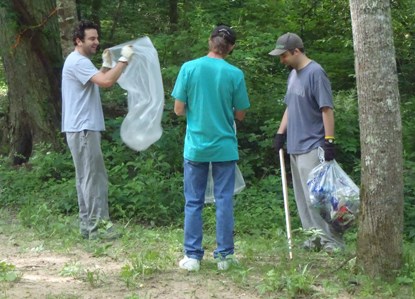 Park volunteers picking up trash.