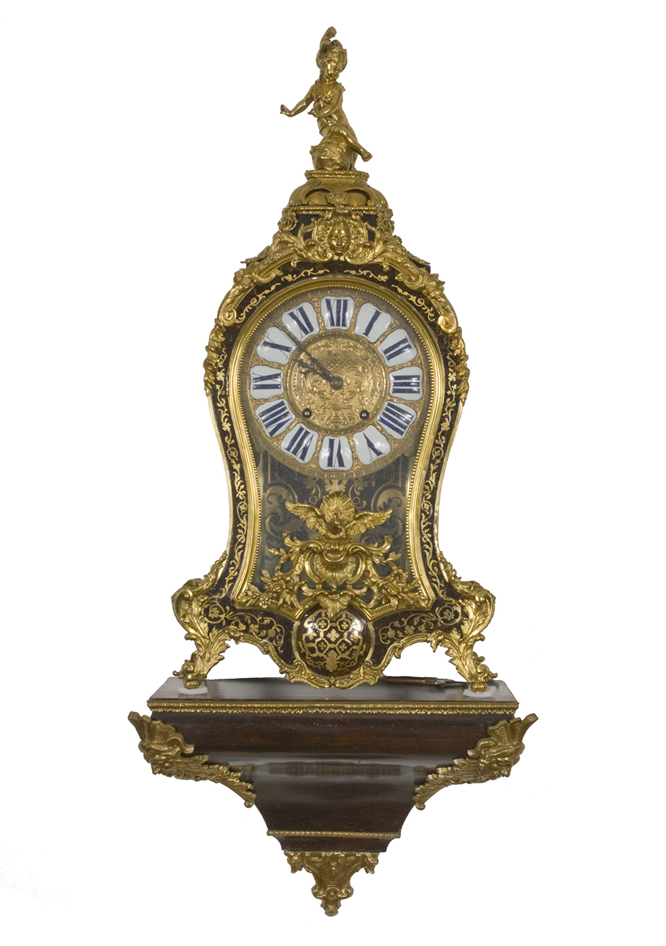 An 18th century clock in the Louis XIV style, with brass and tortoiseshell inlay.