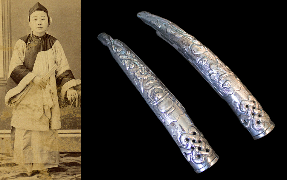 A 19th century Chinese woman wearing silver fingernail guards. Chinese woman wearing silver fingernail guards.