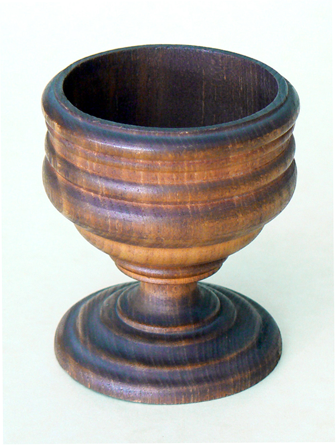 A small wooden cup made from the Washington Elm.
