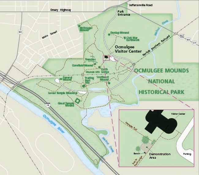 Aerial map of Ocmulgee Mounds National Historical Park indicating the designated areas for demonstrations. This area is located in the lawn area behind the visitor center on the south and west side of the paved sidewalk intersection.