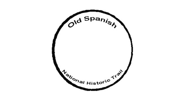 Trail name in black, small text, on the inside of a black circle.