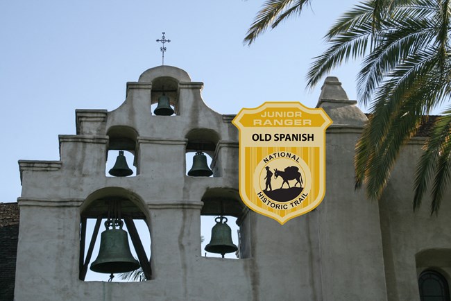 A junior ranger badge on top of an image of a white spanish colonial mission.