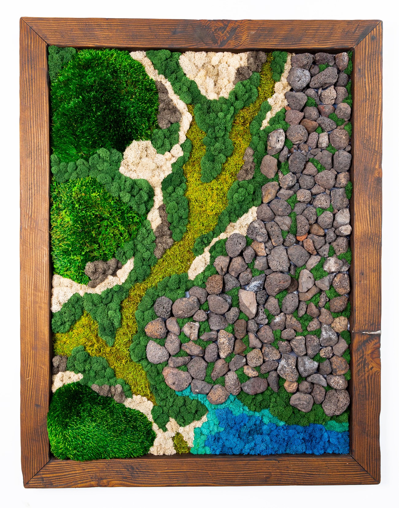 A large wood frame borders a moss wall in which rocks and moss of different colors are arranged to depict a landscape.