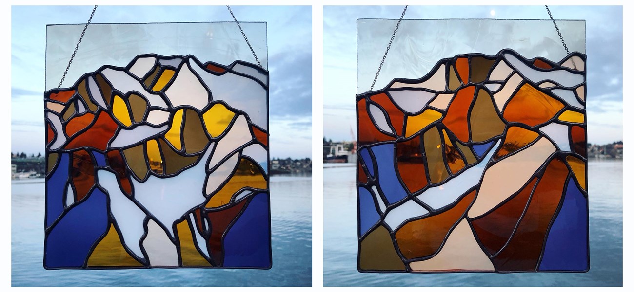 Two stained glass depictions of the same mountain peak. In the first, the glacier is larger than in the second.