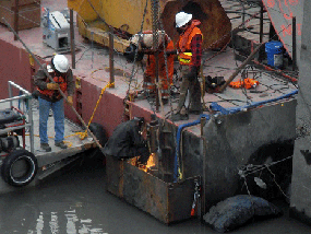 welder working on a barge