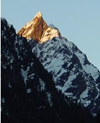 sharp, craggy, snow-covered peak