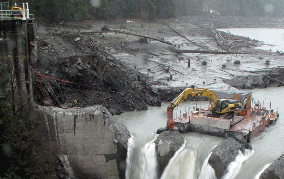 right side of Glines Canyon Dam and barge