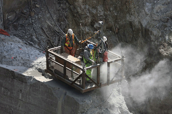 Drilling at Glines Canyon Dam