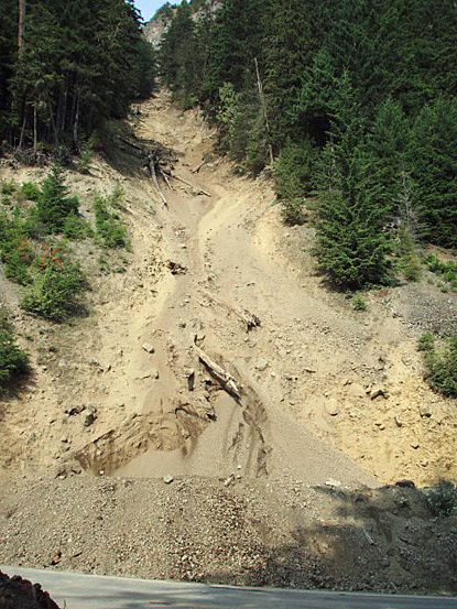 long steep slope of bare rock and gravel