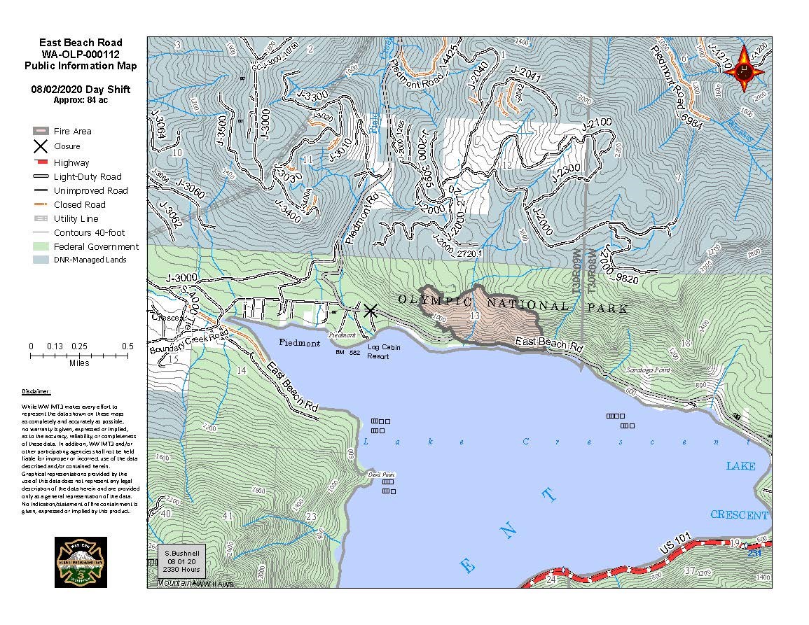 Topographic map of East Beach Road Fire location Map of wildland fire burning on steep slope on north side of East Beach Road at Lake Crescent
