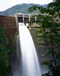 water flowing through a dam spillway