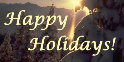 snow covered trees at sunset with words "happy holidays!" in script