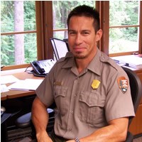 uniformed man in office
