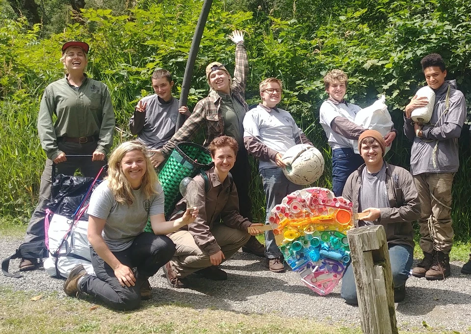 volunteers at Olympic National Park A group of volunteers poses outdoors.