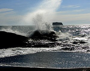 Waves crash on 3rd Beach in winter.
