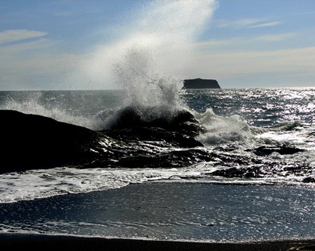 Waves crash on 3rd Beach near Rialto